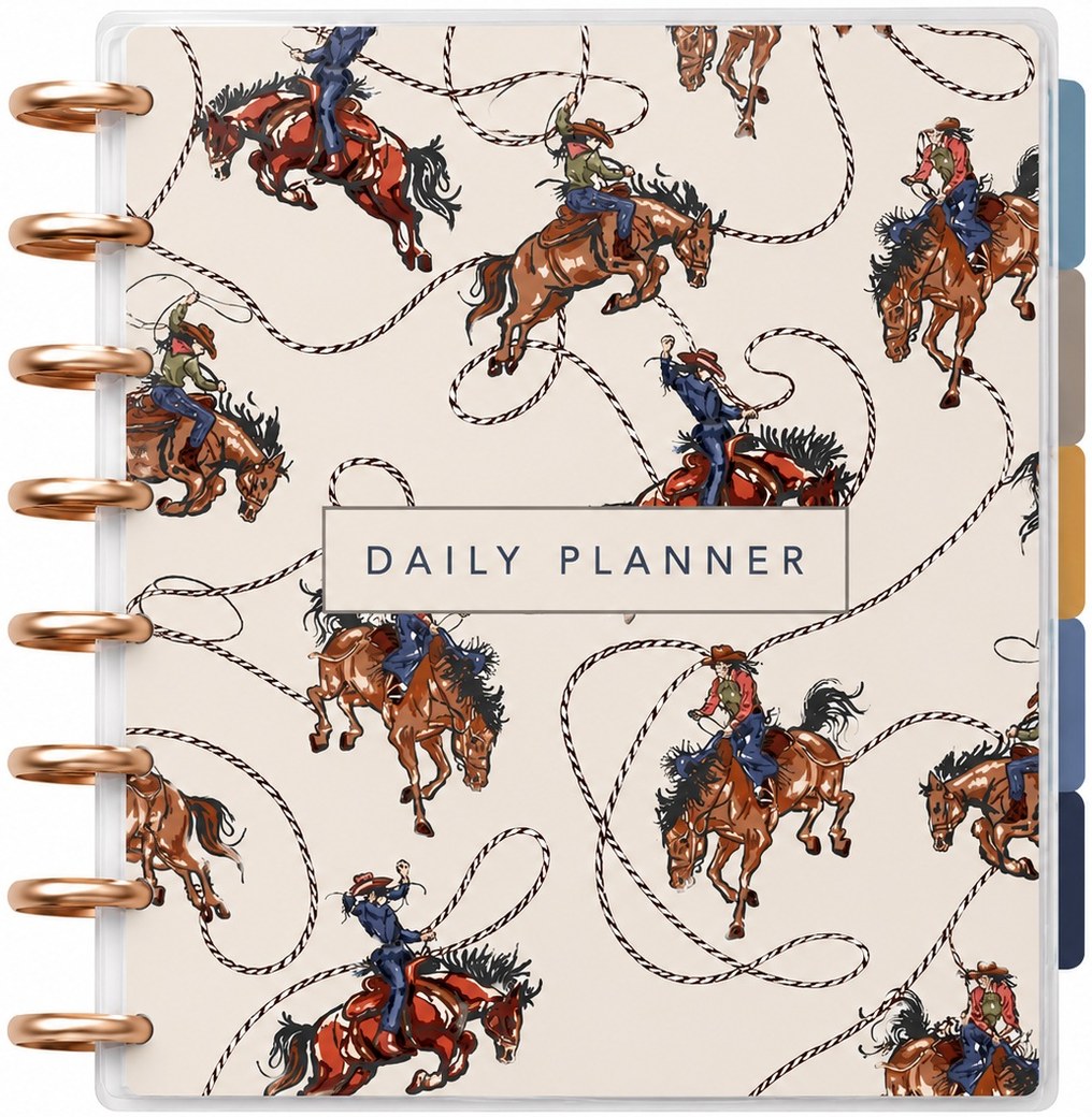A western rodeo discbound daily planner with a 10mil laminated cover, rose gold discs, and colored tab dividers