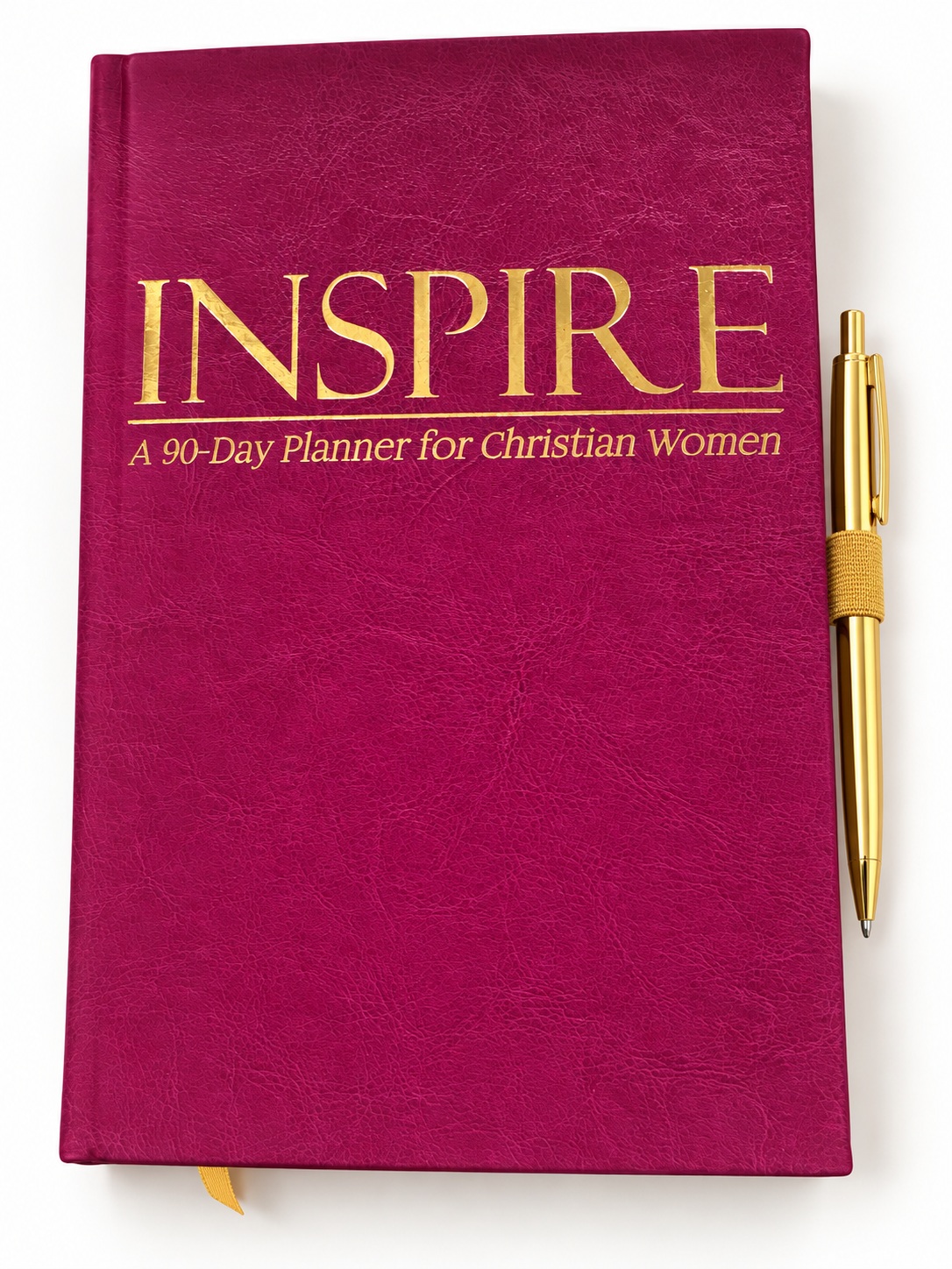 Faux leather hardcover planner with a gold pen held in a gold pen loop