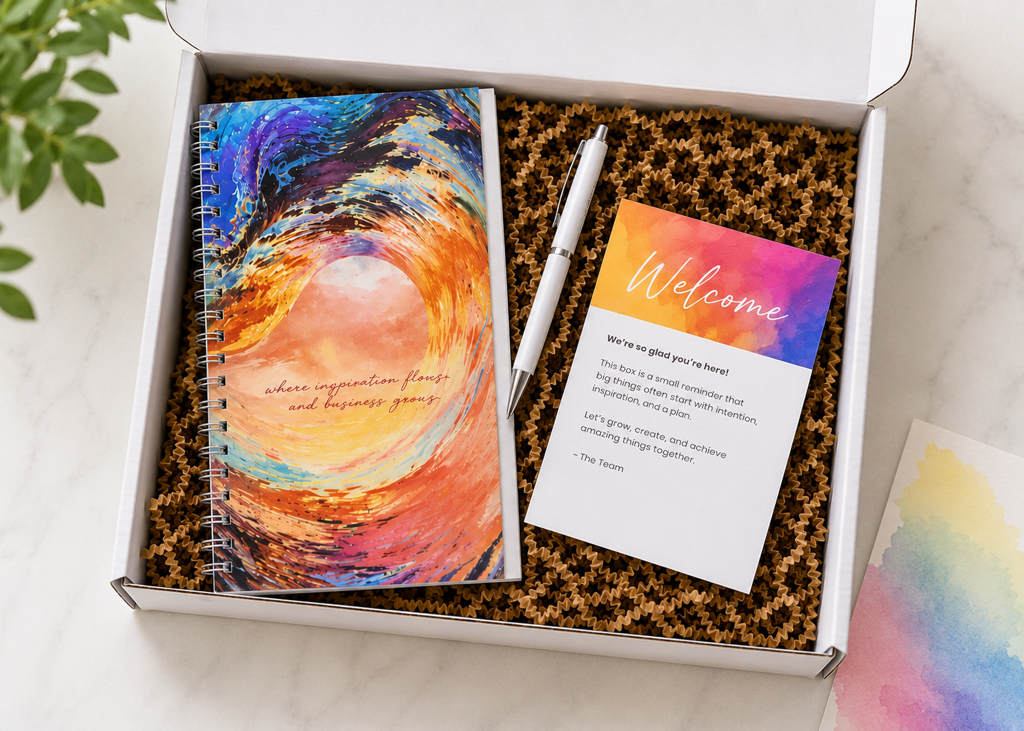 Coaching welcome box with custom spiral journal pen and watercolor welcome card
